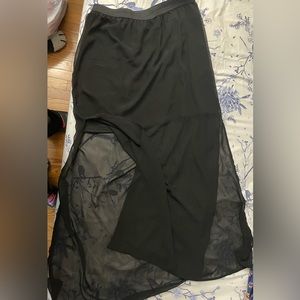 Ankle length , black skirt